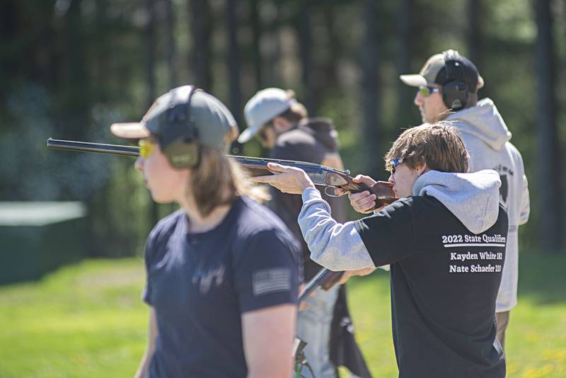Morrison High School trap shooting team member Camden Pruis takes aim during competition Saturday, May 7, 2022. Each team member has 25 shots for 25 birds.