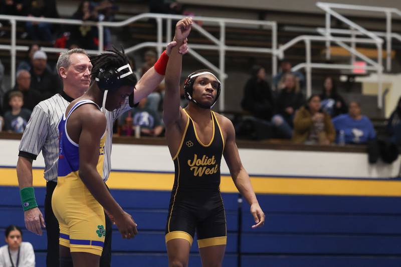 Joliet West’s Aiden Brown defeats Joliet Central’s Yael Lacrosse in the 157-pound weight match at Joliet Central on Friday, Jan 31, 2025.
