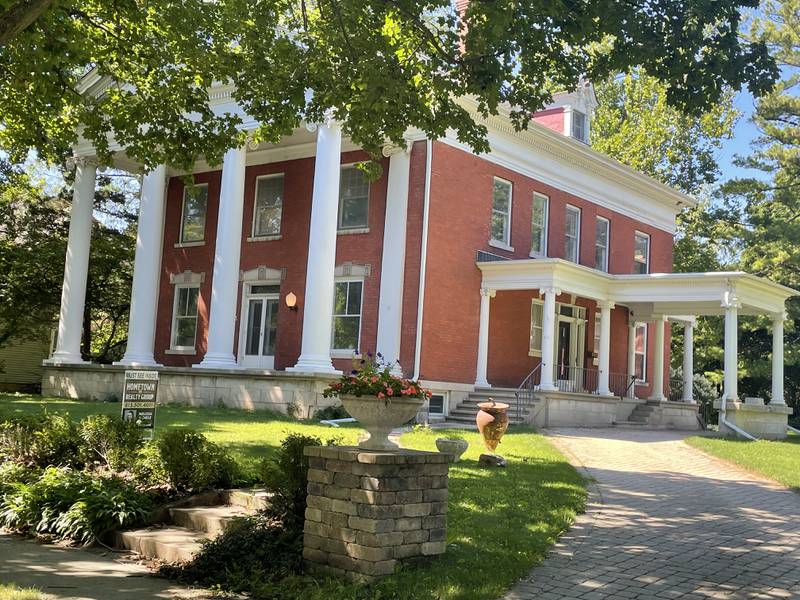 A mansion, located at 411 College Avenue, is seen Aug. 16, 2022 . It has been listed for sale for several weeks and is now under contract. The property was once home to Northern Illinois University's first president, Dr. John Williston Cook.
