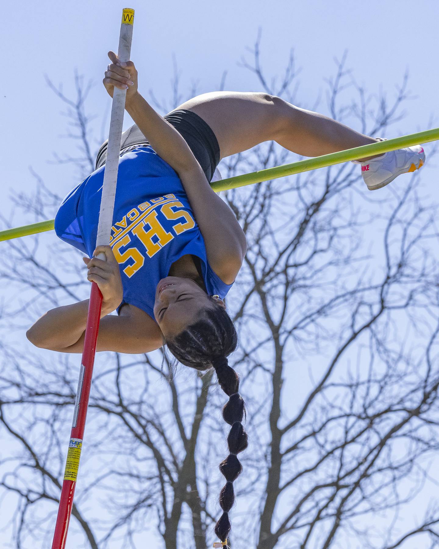 Alexis Punsalan of Somonauk High School wins the women's pole vault after a clearing the bar at 2.9 meters during the Rollie Morris Invite at Hall High School on April 13, 2024.