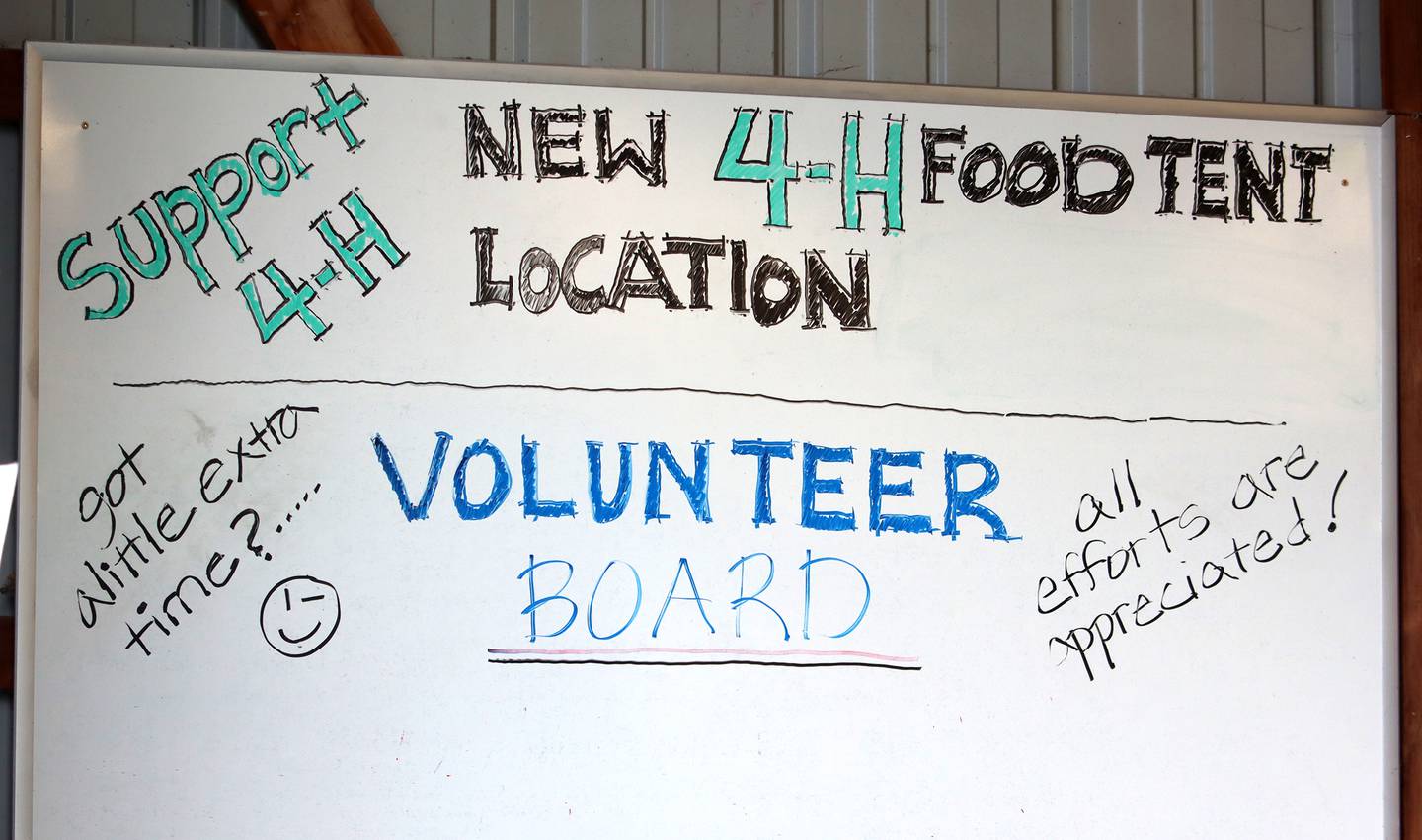 A hand-drawn advertisement makes an appeal for volunteers for the upcoming fair at the McHenry County Fairgrounds on July 13, 2022.