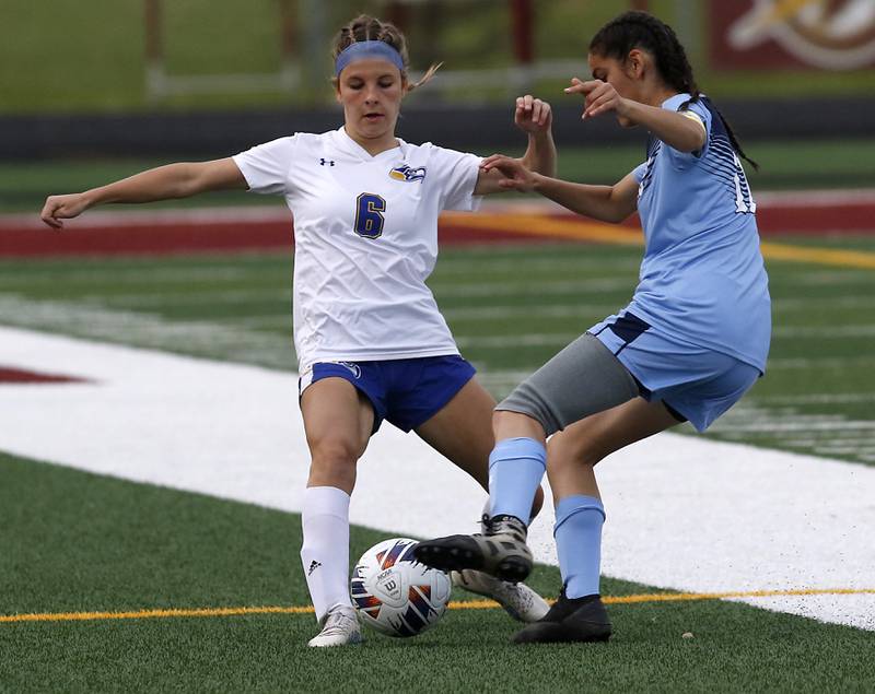 Johnsburg's Kaylee Fouke tries to control the ball in front of Willows’ Izzy Avila during a IHSA Division 1 Richmond-Burton Sectional semifinal soccer match Tuesday, May 16, 2023, at Richmond-Burton High School.