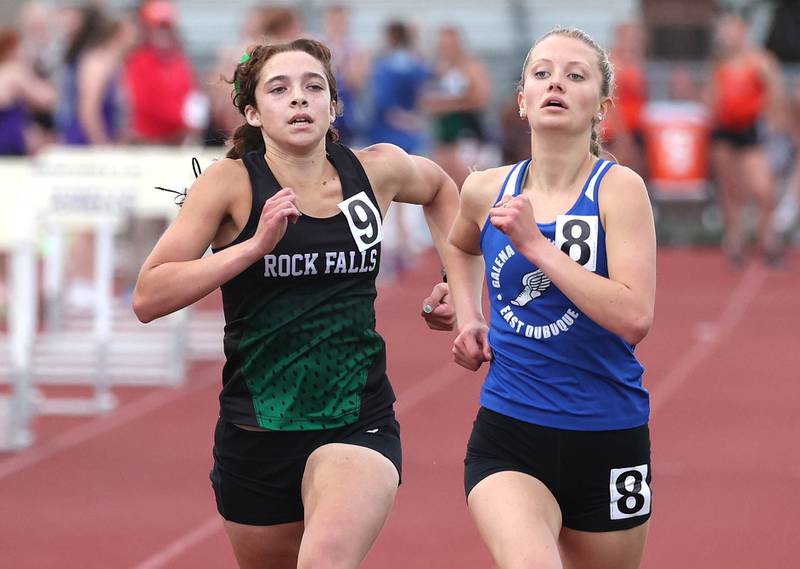 Rock Falls’ Ariel Hernandez just beats Galena’s Avery Engle for second place in the 3200 meters Wednesday, May 8, 2024, during the girls track Class 2A sectional at Rochelle High School. Hernandez qualified for state.