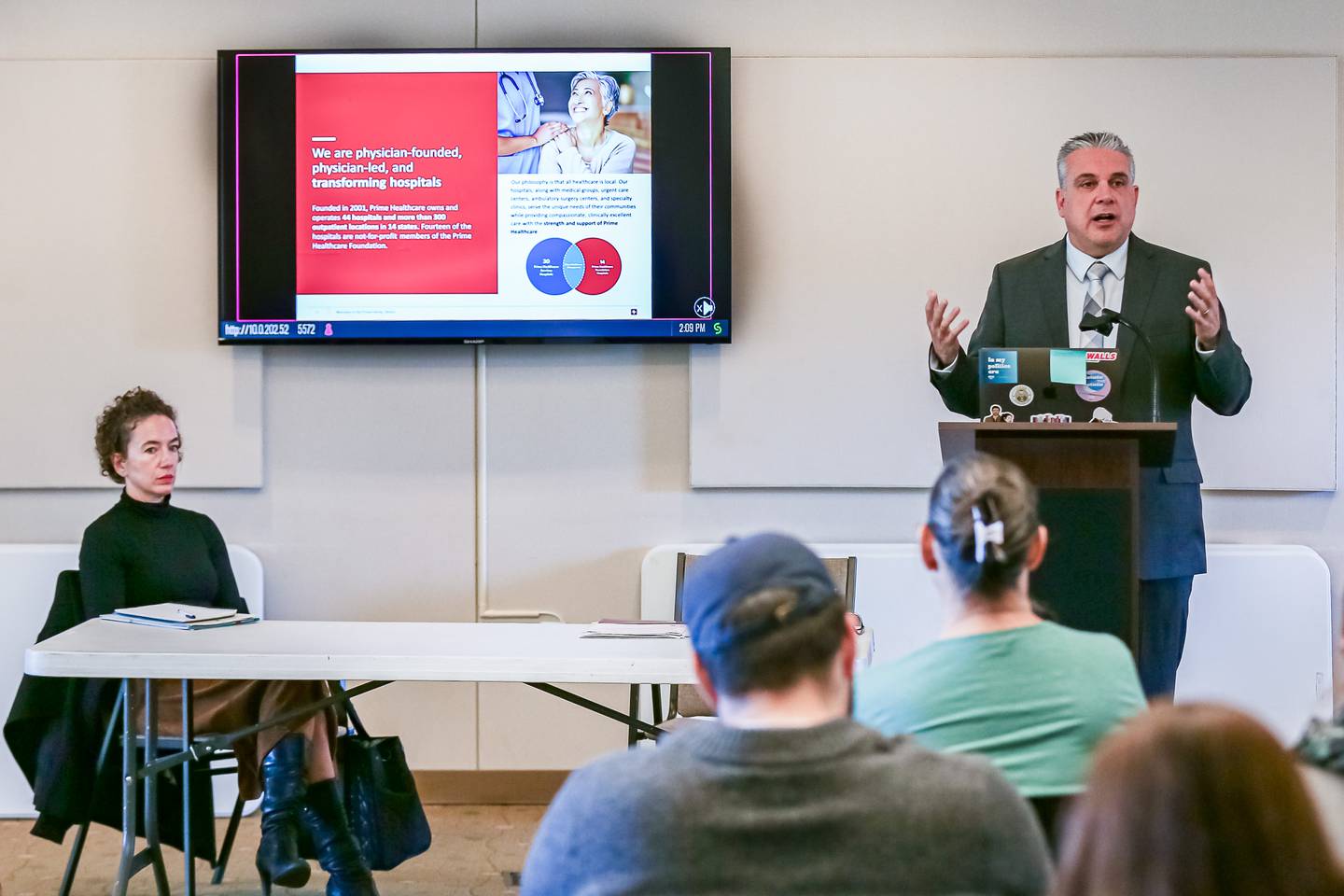 Prime Healthcare's Senior Director of Government Relations, Fred Ortega gives a presentation at the Community Town Hall to discuss Prime HealthCare's acquisition of Saint Joseph Hospital. Oct 16, 2024 in Joliet.