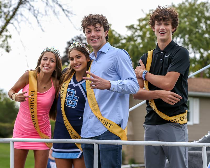 The Downers Grove South Homecoming Court ride in the Downers Grove South Homecoming Parade. Sept 28, 2024 in Downers Grove.
