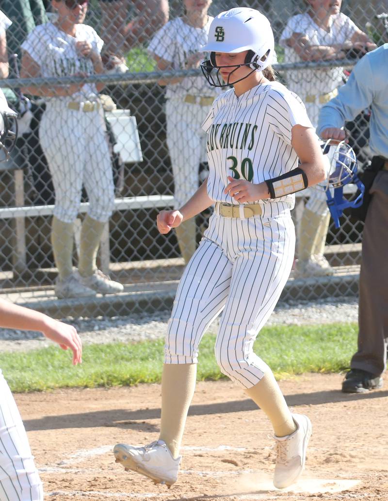 St. Bede's Quinn McClain scores a run against Woodland/Flanagan-Cornell on Monday, April 29, 2024 at St. Bede Academy.