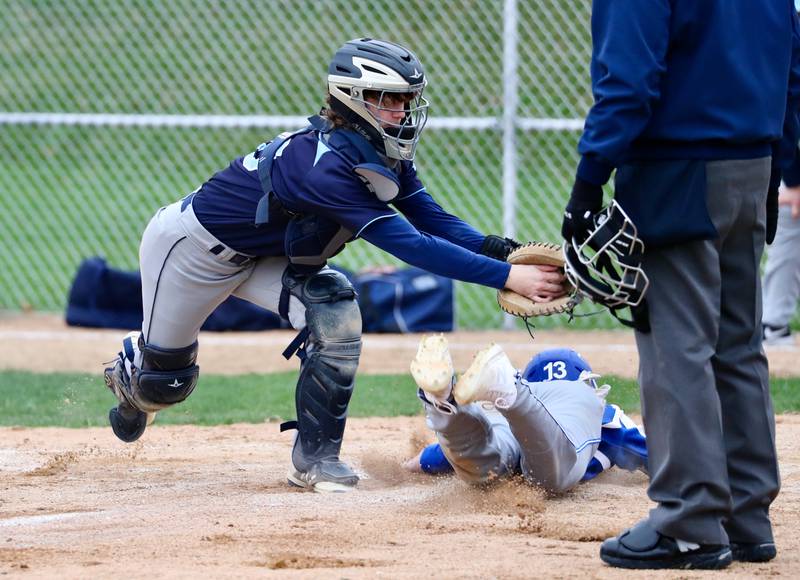 Princeton's Ryan Brucker slides home.