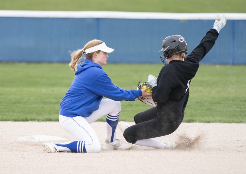 Burlington Central's Rylie Duval makes the tag at 2nd base on Prairie Ridge's Adysen Kiddy during their game on Wednesday, April 27, 2022 at Burlington Central High School. Ryan Rayburn for Shaw Local