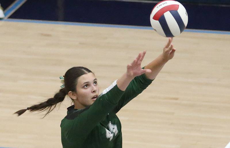 St. Bede's Hannah Waszokowiak pushes the ball to the Marquette side of the net on Thursday, Sept. 4, 2025 at Bader Gym.