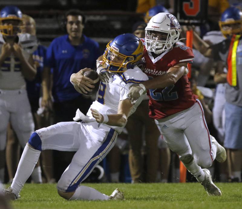 Marian Central's Matt Lajb, right, tackles Johnsburg's Anthony Bravieri during a non-conference football game Friday, Sept. 2, 2022, between Marian Central and Johnsburg at Marian Central High School.