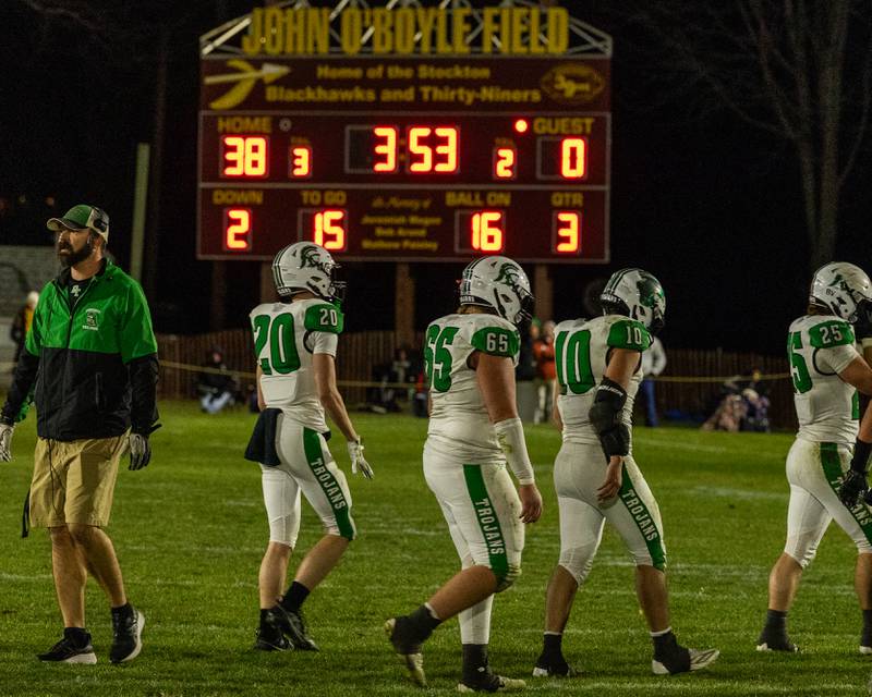 Dwight players walk off field in third quarter with heads down as they're down 38-0 against Stockton on Saturday, November 15, 2025 at John O' Boyle Field in Stockton.