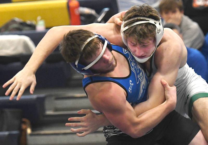 West Carroll's Cole Herrell and Parkview/Albany's Tavin Bombkamp wrestle in the 150-pound championship match at the Polo Wrestling Invitational on Saturday, Jan, 10, 2026 at Polo High School.