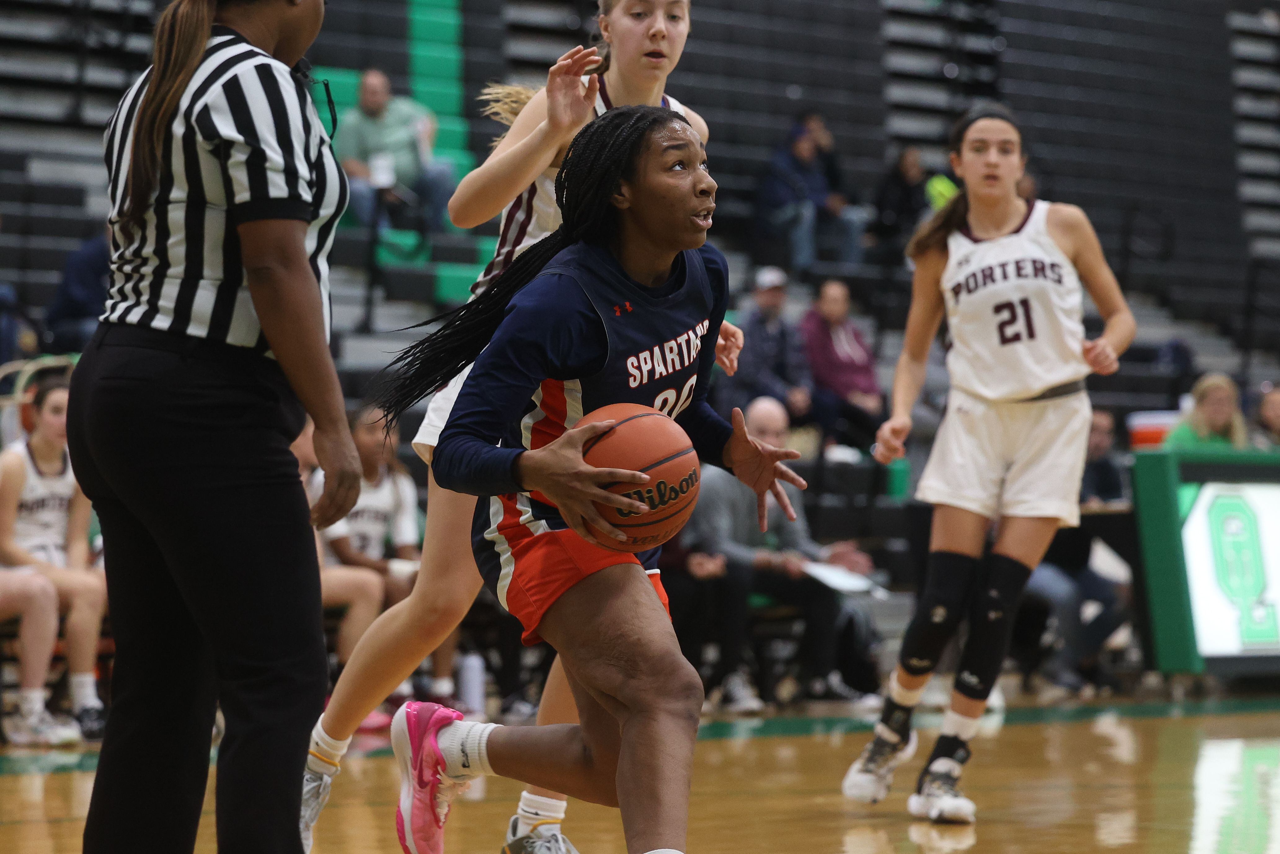 Romeoville’s Laila Houseworth drives the baseline for a shot against Lockport in the Oak Lawn Holiday Tournament championship on Saturday, Dec.16th in Oak Lawn.