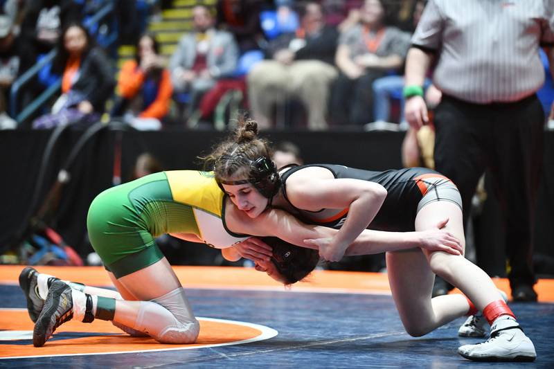 Angelina Gochis of Kaneland, right, and Annalee Aarseth of Crystal Lake South wrestle in the 110-pound championship match in the IHSA Girls Individual State Finals on Saturday, March 1. Gochis took first place over Aarseth.