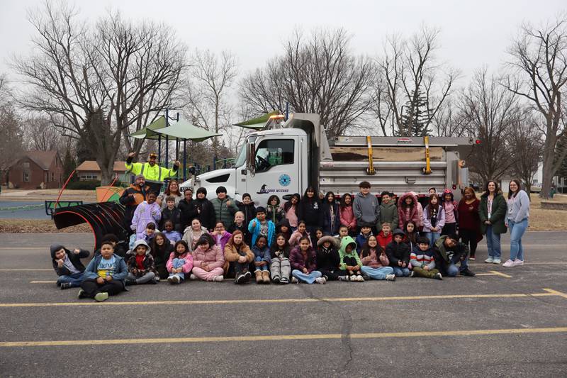 Taft Elementary School students in Joliet stand alongside the newly named Snow Buster city snow plow. The city of Joliet in January invited students with Joliet Public Schools District 86  to submit names for city snow plows.