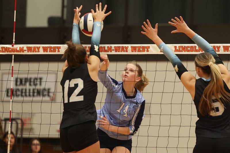 Plainfield South’s Grace Malek tries to power a shot through the defense of Joliet Catholic in the Class 4A Lincoln-Way West Regional semifinal on Tuesday, Oct. 29, 2024 in New Lenox.