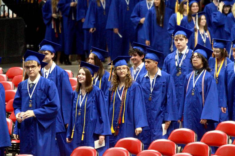 Geneva High School graduates enter for the school’s commencement ceremony on Tuesday, June 3, 2025 at Northern Illinois University in DeKalb.