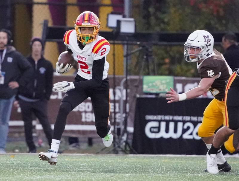 Batavia's Isaiah Brown (2) returns a punt during a class 7A semifinal football playoff game against Mt. Carmel at Mt. Carmel High School in Chicago on Saturday, Nov 18, 2023.