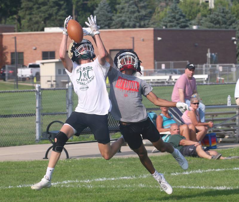 Ottawa's Hezekiah Joachim (at right) breaks up a pass in the end zone intended for St. Bede's Hunter Savage during a 7-on-7 Monday, July 17, 2023, at Ottawa High School.