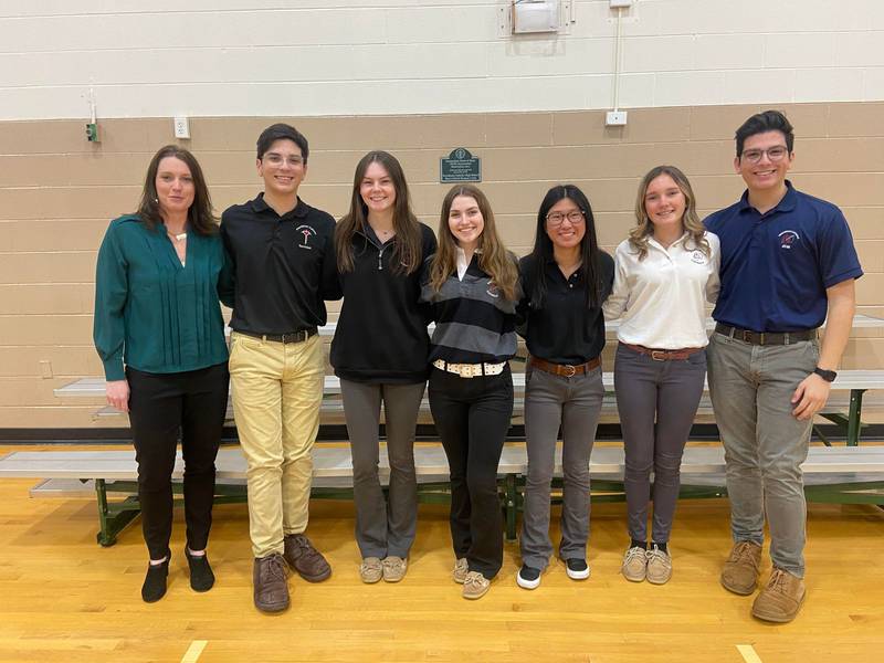 Providence Catholic High School in New Lenox inducted 64 students and six student directors into the school’s Augustinian Youth Ministry organization on Tuesday, April 5, 2022, at the school. Pictured is Jen Williams, moderator, and the six student directors: Nick Pugh, Ashlee Jackson, Katie Piko, Elizabeth Rusiniak, Kailey Wolniakowski and Nathan Pugh.