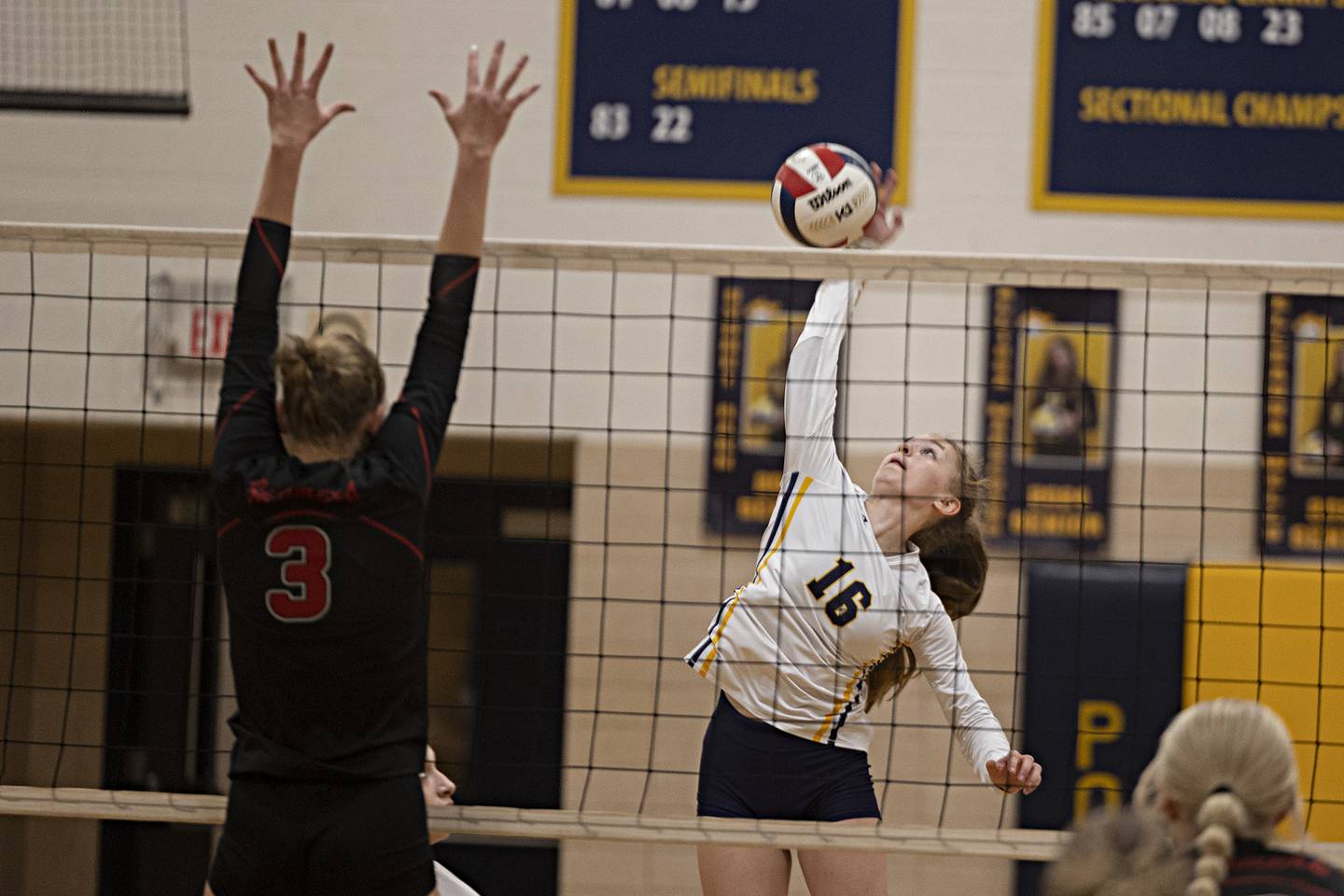Polo’s Bridget Call spikes the ball against Fulton’s Annaka Hackett Thursday, Sept. 14, 2023 in Polo.