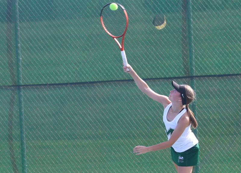 Kankakee-Mcnamara's Jenna Strawson serves during the Class 1A girls tennis sectionals on Thursday, Oct. 16, 2025 at Ottawa High School.