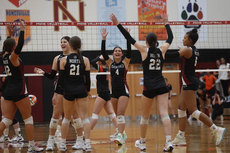 Plainfield North celebrates a two set win over Plainfield East on Tuesday, Oct. 10, 2023 in Plainfield.