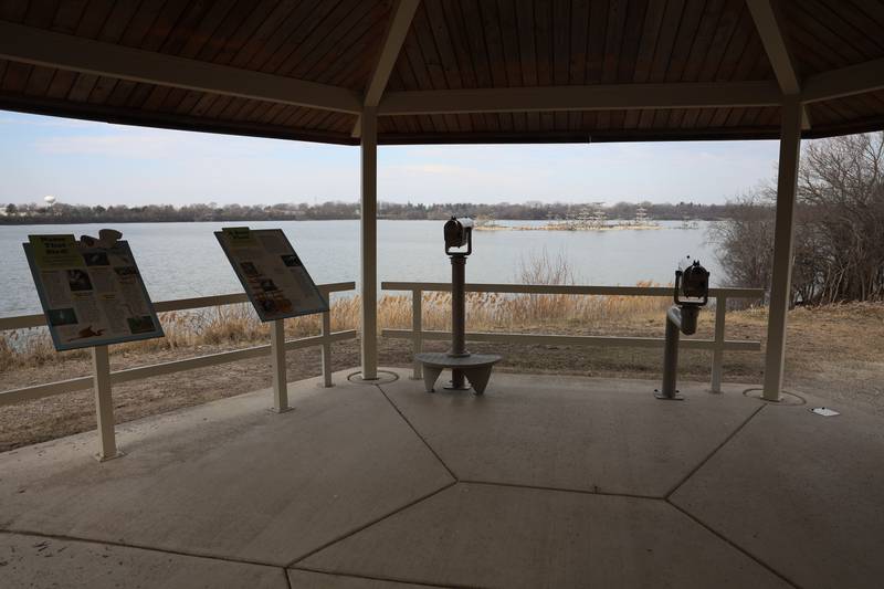 Information boards and telescopes are set up near the main nesting island at the Lake Renwick Heron Rookery Nature Preserve in Plainfield on Thursday, March 26, 2026.