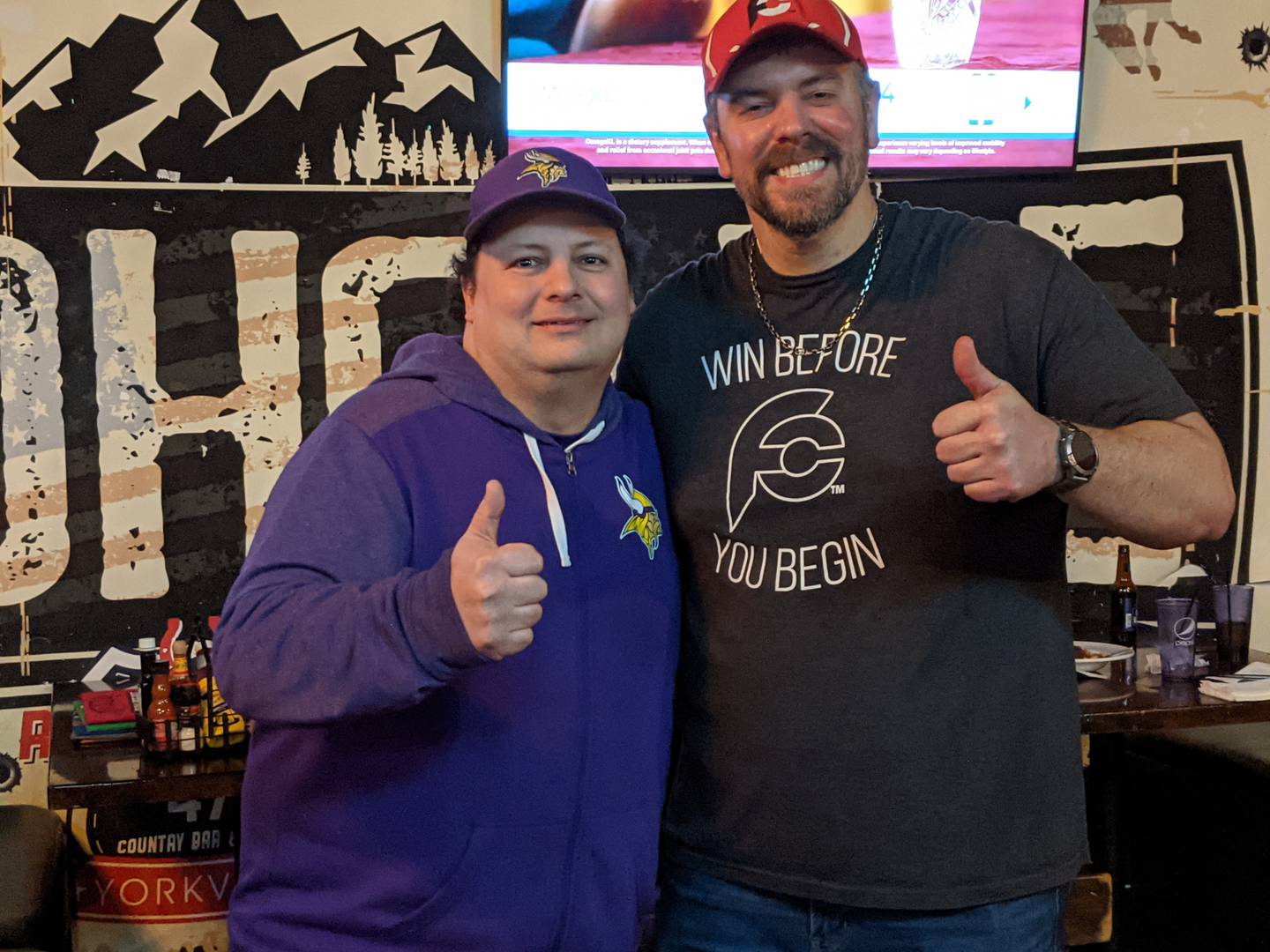 Steven Weiner of DeKalb, left, met professional eater Randy Santel after he took on the Big Hoss Challenge at Roadhouse 47 in Yorkville on Jan. 26.