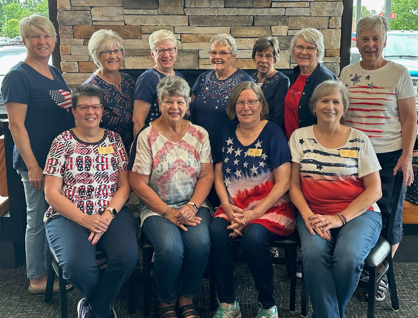 Quilts of Valor Seamstresses including (front from left) Terry Johnson, Liz Piacenti, Barb Amrein, Ann Register, (Back from left) Tracy Hannon, Susan Friel, Betty Baznik, Carol Gerbitz, Barb Donahue, Shirley Steele and Betty Stocking.