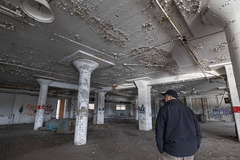 Sterling City Manager Scott Shumard tours the Lawrence Brothers building Nov. 11, 2022.