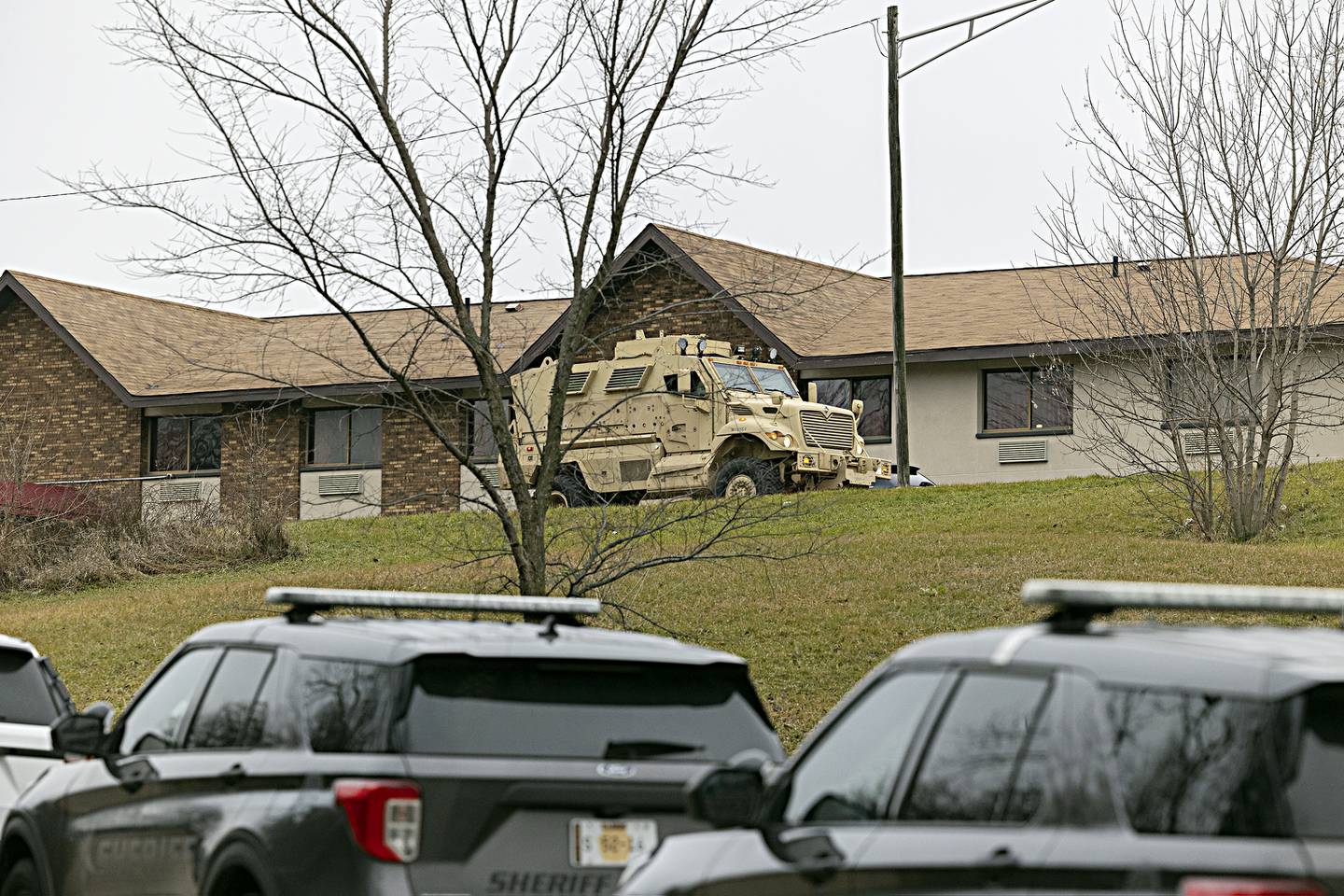 A SWAT vehicle is seen in the parking lot of the Magnuson Hotel Sunday, Dec. 17, 2023 outside of Dixon.