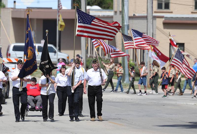 Members of VFW Post 5768 and American Legion Post 99 head east on Elm Street Monday, May 29, 2023, during the Sycamore Memorial Day parade.