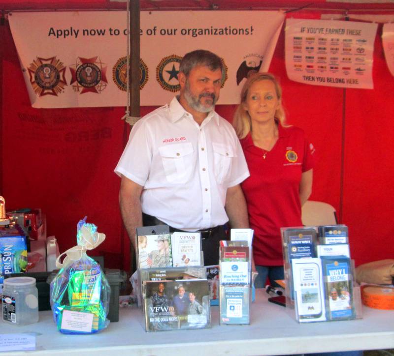 Pictured are Todd Latham, Sandwich mayor and member of the Sandwich VFW Post #1486 and American Legion Post #181, and Celeste Latham, Commander of the Sandwich American Legion Post #181, working the Sandwich American Legion/VFW booth at the Sandwich Fair.