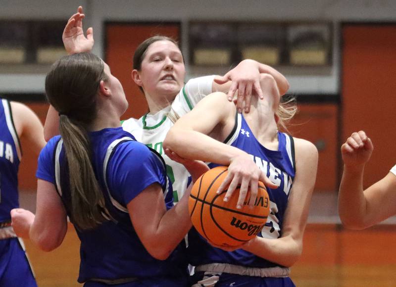 Crystal Lake South’s Gaby Dzik, left, lands a forearm on Geneva’s Emma Peterson under the hoop in girls IHSA Class 3A Sectional Championship basketball on Thursday, Feb. 26, 2026, at Crystal Lake Central High School in Crystal Lake.