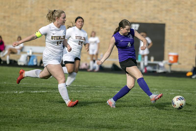 Dixon’s Carlie Cook takes a shot for the Duchesses’ second goal of the game against Sterling Tuesday, May 9, 2023.