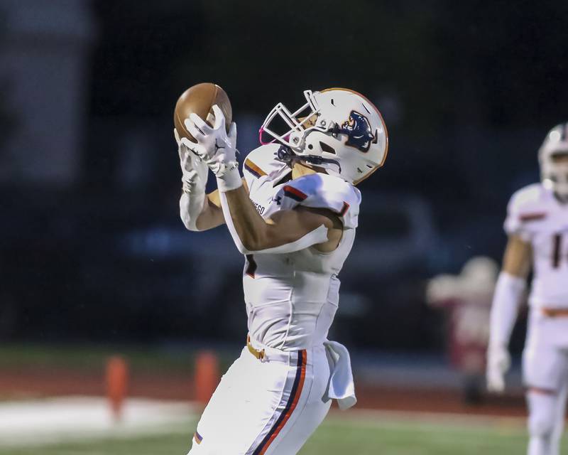 Oswego's Teddy Manikas (1) comes down with a reception during football game between Oswego at Naperville Central  on Friday, Aug 29, 2025  in Naperville.