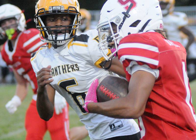 Eisenhower's Garryon Henderson (6) eyes Streator's Layzeric Moton on Friday, Aug. 29, 2025 at Doug Dieken Stadium in Streator.