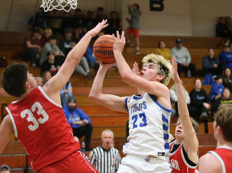 Princeton's Noah LaPorte shoots a shot over Ottawa's Cooper Knoll on Monday, Feb. 5, 2024 at Prouty Gym.