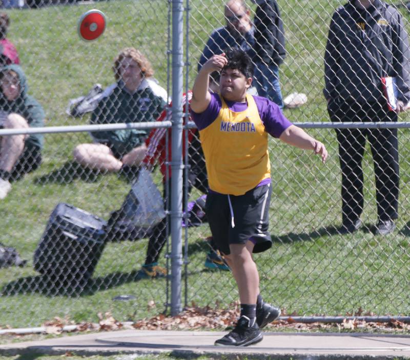 Mendota's Gabe Vallejo throws discus during the Rollie Morris Invite on Saturday, April 16, 2022 at Hall High School in Spring Valley.