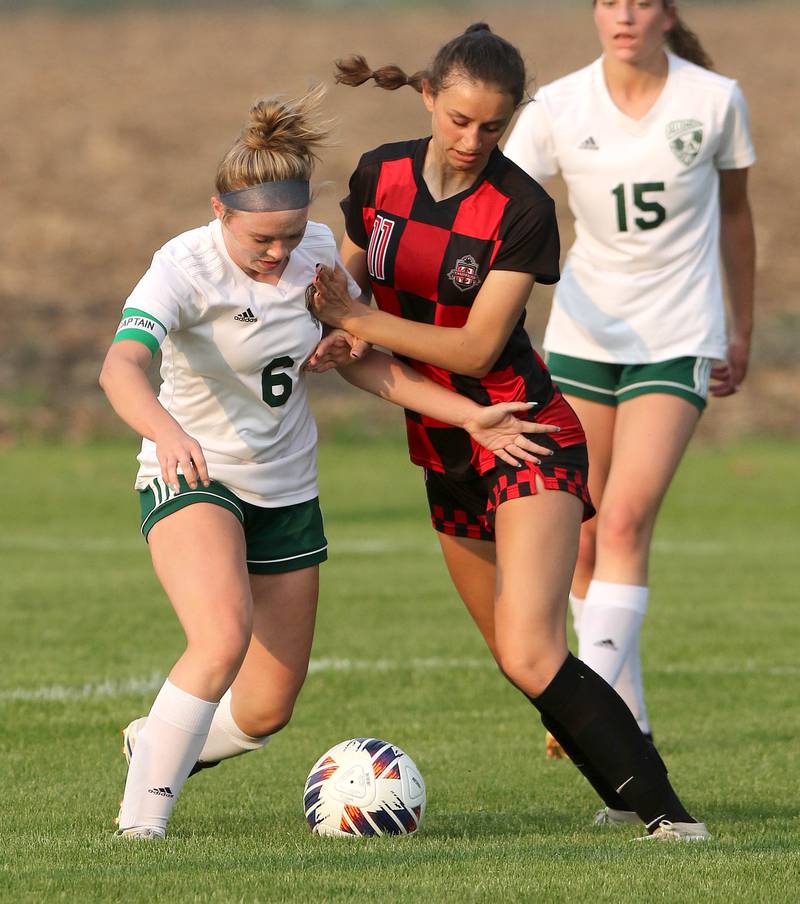 Indian Creek's Izzy Turner and Alleman's Mackenzie Burkett fight for possession during their Class 1A sectional final game Friday, May 19, 2023, at Hinckley-Big Rock High School.