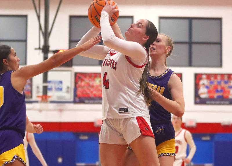 Huntley’s Maya Mangan works under the hoop against Hononegah in girls basketball at Dundee-Crown High School in Carpentersville on Tuesday, November 25, 2025.