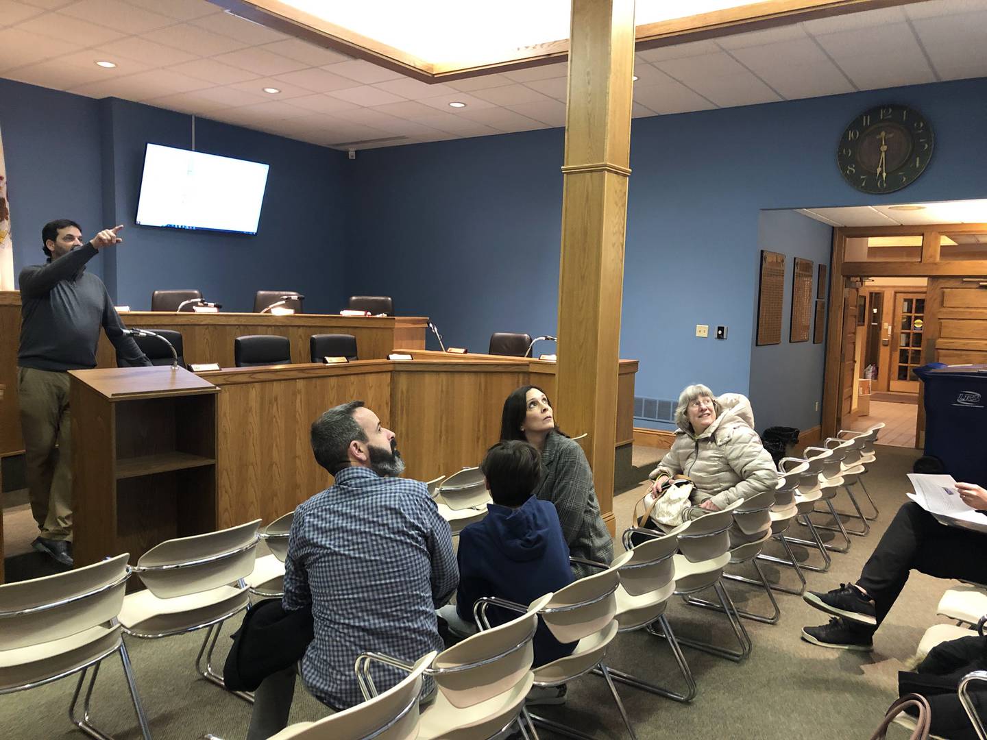 La Salle Finance Director John Duncan helps residents find their new trash pickup schedule on the LRS pickup maps at La Salle City Hall on Tuesday, Jan 17, 2023.