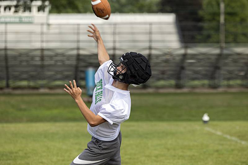 Rock Falls players run through drills Tuesday, August 8, 2023 during the first week of football practice.