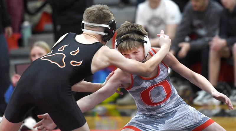Oergon's Kayden Cover reaches for Byron's Aiden Salo in their 108-pound third place match at the 1A Stillman Valley Sectional on Saturday, Jan. 31, 2026 at Stillman Valley High School.