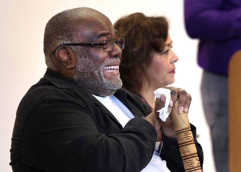 Leroy Mitchell smiles as he listens to speakers Friday, Aug. 8, 2025, during the grand opening celebration for the school that bears his name, Dr. Leroy A. Mitchell Elementary School in DeKalb.