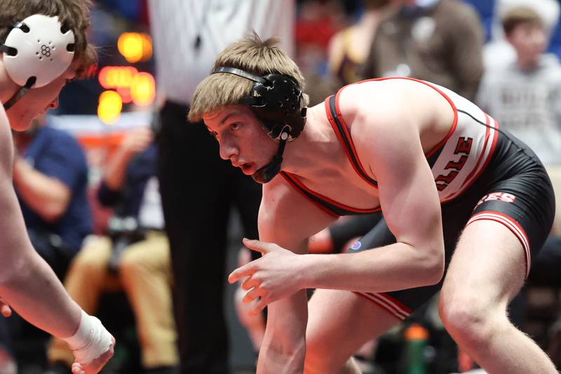 Yorkville’s Jack Ferguson faces off against Mt. Carmel’s Liam Kelly in the Class 3A dual state championship on Saturday, Feb. 24th 2024 in Bloomington.
