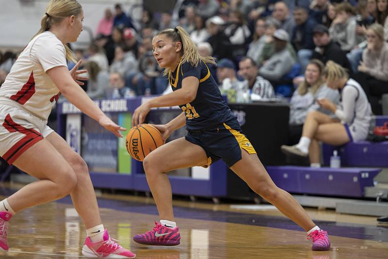 Sterling’s Jaelynn James handles the ball against Stillman Valley Saturday, Dec. 27, at the Duchesses Basketball Christmas Classic.