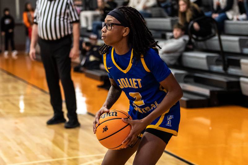 Joliet Central's Ta’niya Banks prepares to shoot during a WJOL Girls Basketball Tournament game against Minooka at Minooka on Nov. 19, 2025