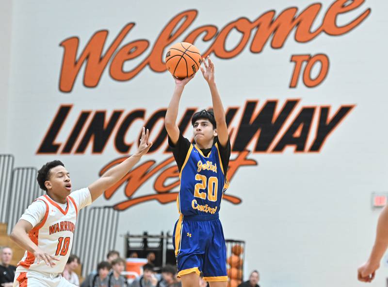 Joliet Central's Valentin Conejo (20) shoots a three point basket during the 4A Lockport Regional game against Lincoln-Way West on Monday, FEB. 23, 2026, at New Lenox.